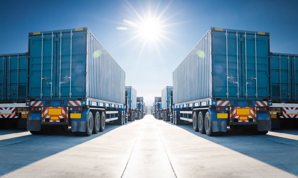 Delivery vehicles and containers in an industrial yard